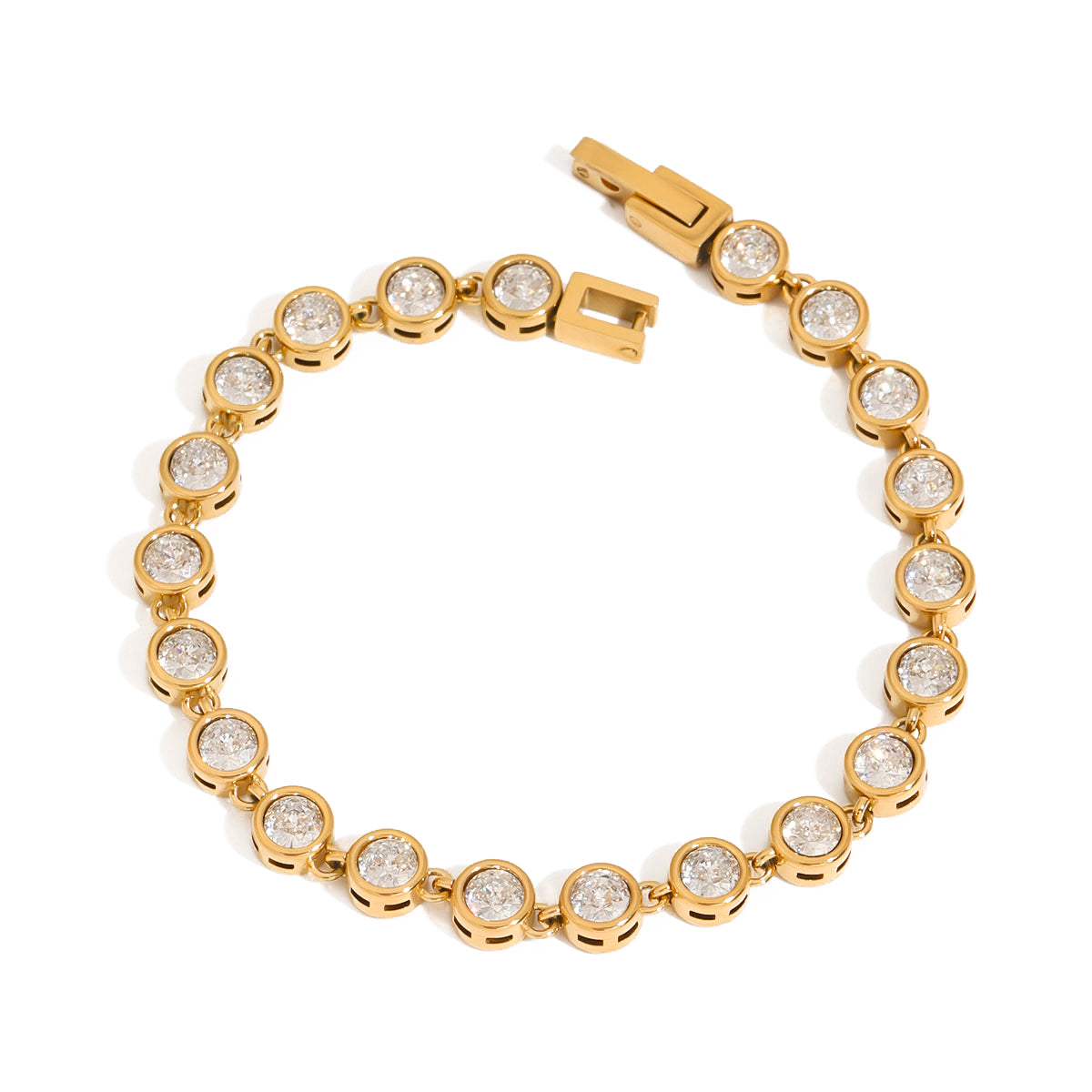 Gold bracelet with diamond-like stones on a white background