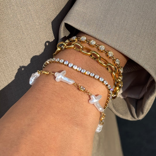 Amayah Jewelry Pearl Cross Bracelet — cross shaped baroque pearls alternating with bezel crystal stations on gold chain
