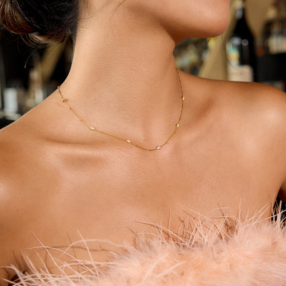 Amayah Jewelry Celeste Station Necklace - delicate satellite chain with pavé marquise crystal stations on white background