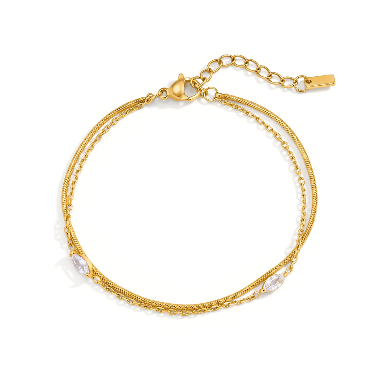 Gold bracelet with chain and pearl-like accents on a white background