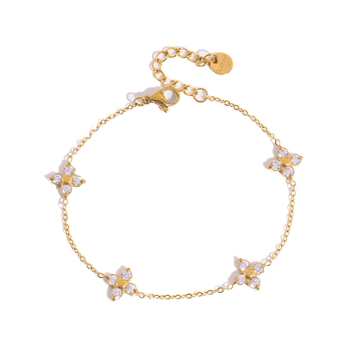Gold bracelet with butterfly-shaped charms on a white background