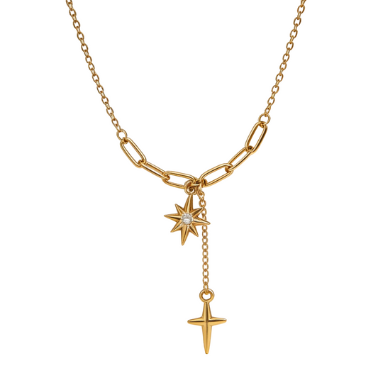 Gold paperclip chain necklace with crystal north star and gold dagger cross charms — waterproof hypoallergenic celestial statement jewelry