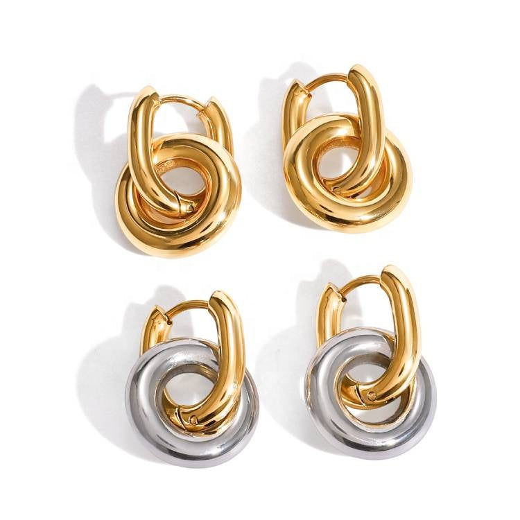Chunky interlocked double hoop earrings in gold and two-tone gold silver on white background