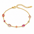 A gold chain bracelet featuring multiple colorful gemstones in oval, rectangular, and round settings, displayed on a clean white background.