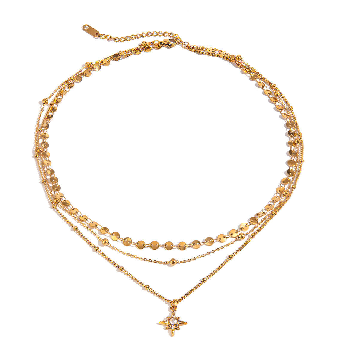 Amayah Jewelry Sienna Layered Star Necklace — triple layer coin chain and cable chain with crystal north star pendant