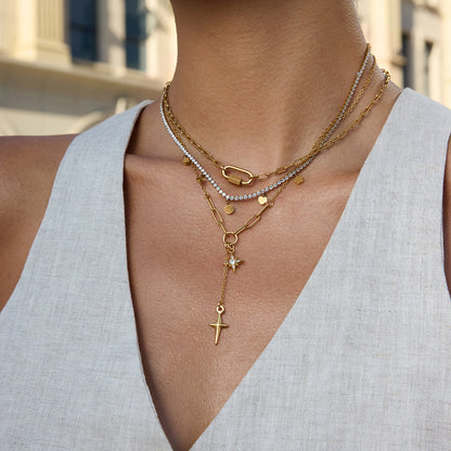 Gold paperclip chain necklace with crystal north star and gold dagger cross charms — waterproof hypoallergenic celestial statement jewelry