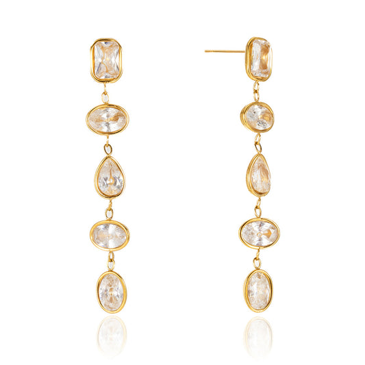 Long linear crystal drop earrings with mixed bezel-set stones. Gold dangle earrings, five stone drop, waterproof and hypoallergenic. Glamorous women's earrings.