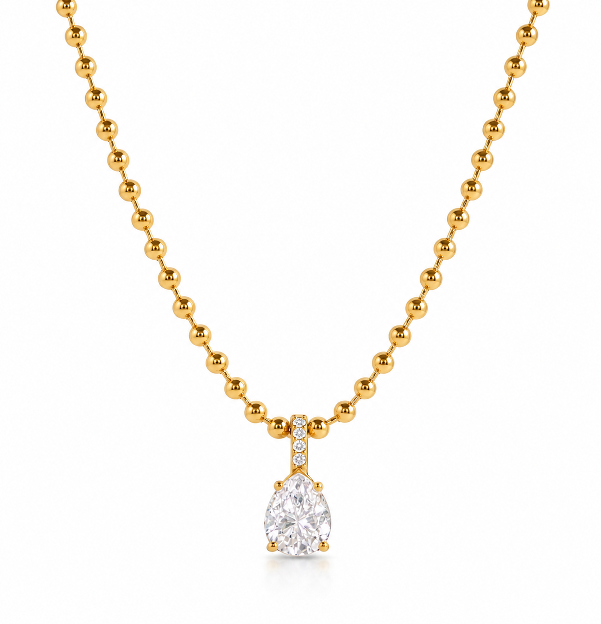 A gold ball chain necklace with a pear-cut diamond pendant and a small diamond accent above it, shown on a clean white background.