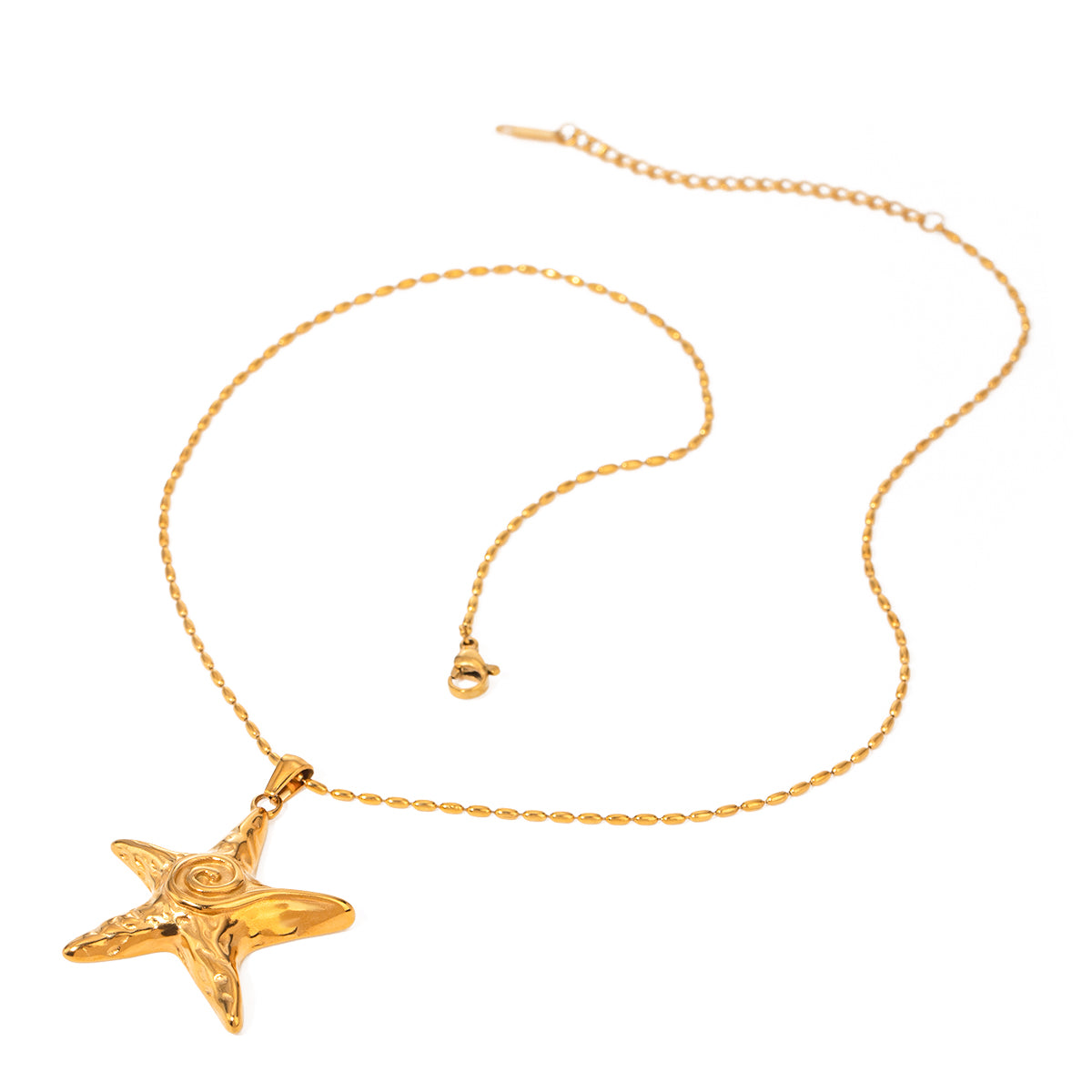 Gold hammered starfish pendant necklace on oval link chain with lobster clasp, white background