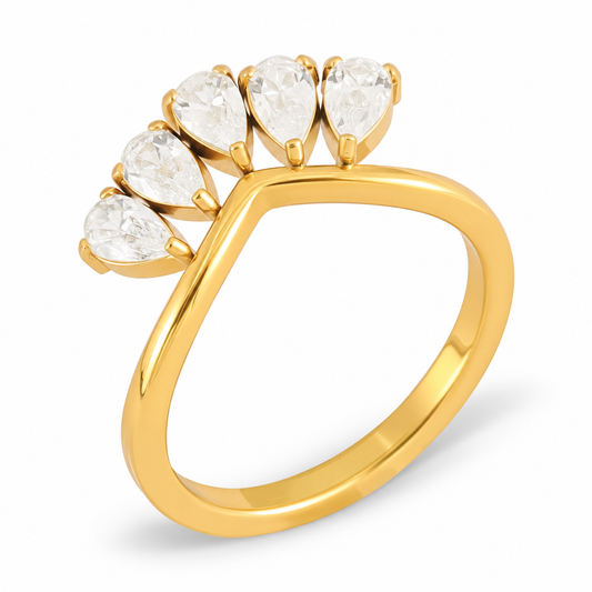 A yellow gold ring featuring a curved shank and a cluster of five pear-cut clear gemstones at the top, shown on a clean white background.
