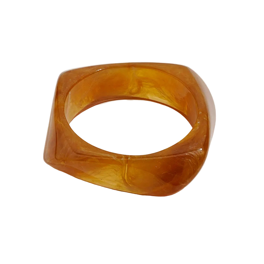 Amayah Jewelry Savanna Resin Bangle Set — three chunky resin bangles in tortoise, white marble, and brown