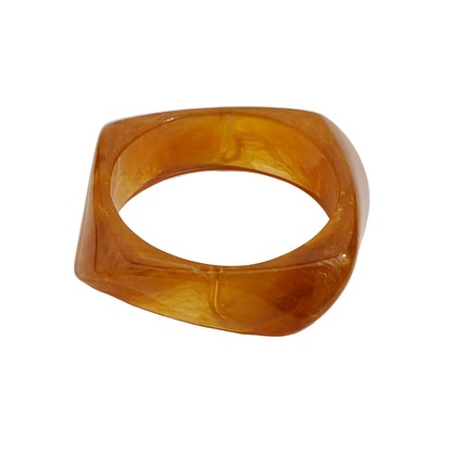 Amayah Jewelry Savanna Resin Bangle Set — three chunky resin bangles in tortoise, white marble, and brown
