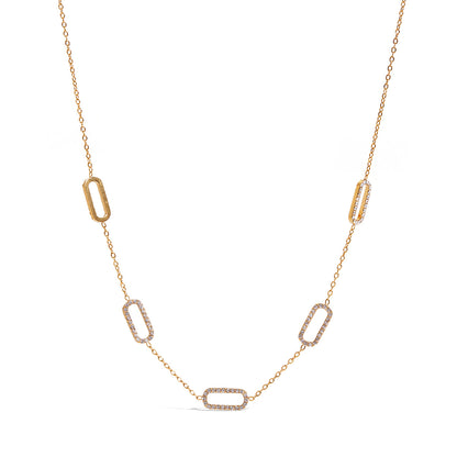 Amayah Jewelry quince link necklace  - delicate chain with open rectangular crystal and plain link stations on white background