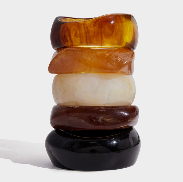 Amayah Jewelry Savanna Resin Bangle Set — three chunky resin bangles in tortoise, white marble, and brown 