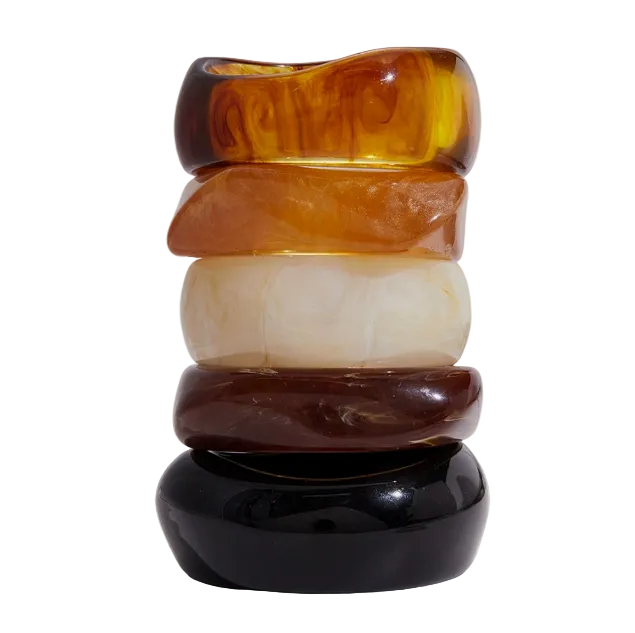 Amayah Jewelry Savanna Resin Bangle Set — three chunky resin bangles in tortoise, white marble, and brown 