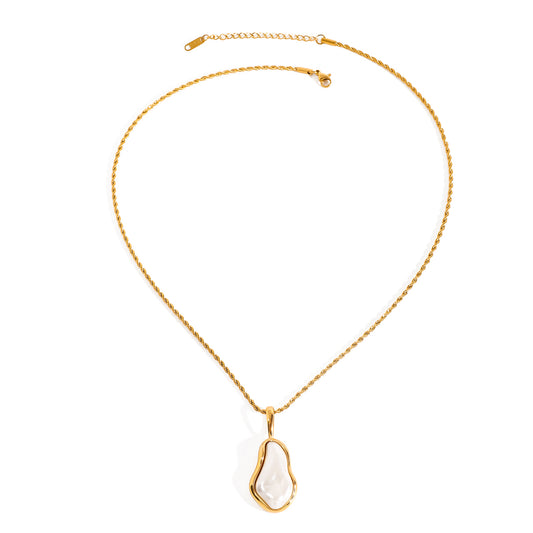 Amayah Jewelry Camille Pearl Pendant Necklace — baroque pearl in open gold frame bezel on twisted rope chain, white background