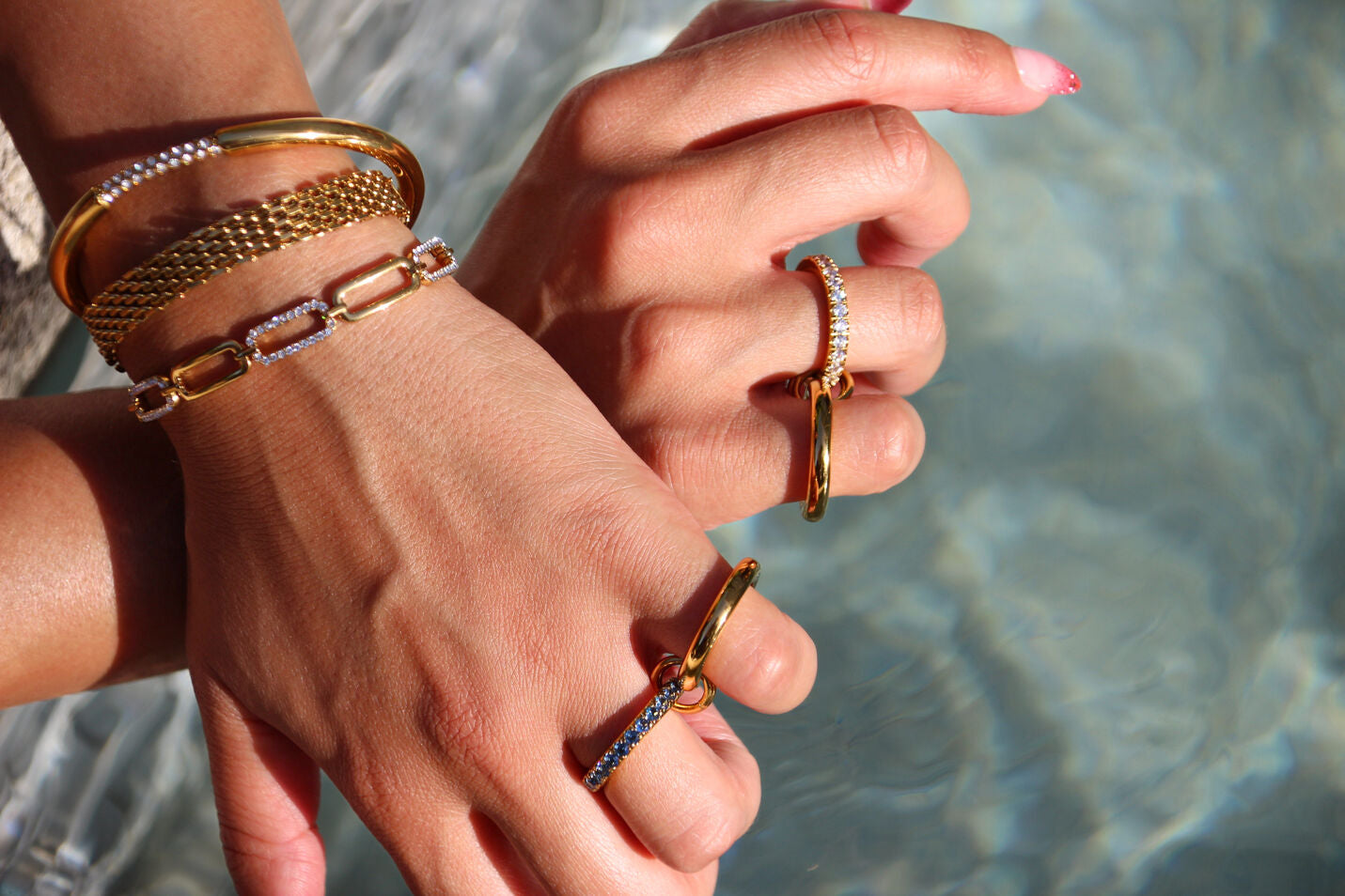 Gold-plated stainless steel statement ring with sparkling stones, waterproof and tarnish-resistant, perfect for bold and stylish looks.