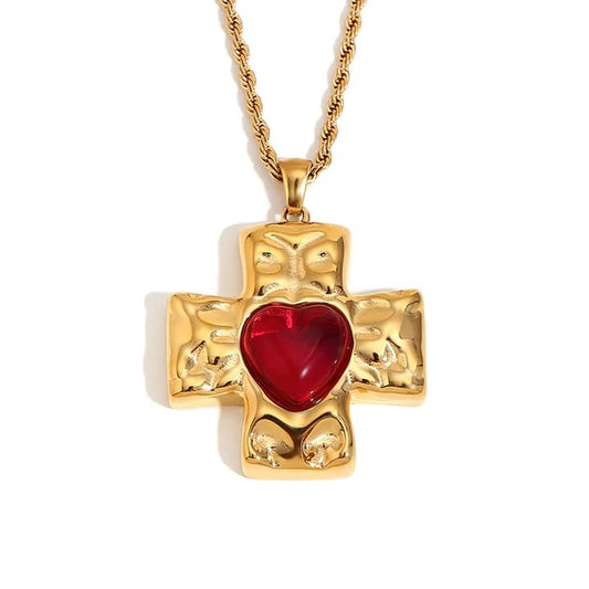Gold-plated hammered cross pendant with heart-shaped ruby and twisted chain