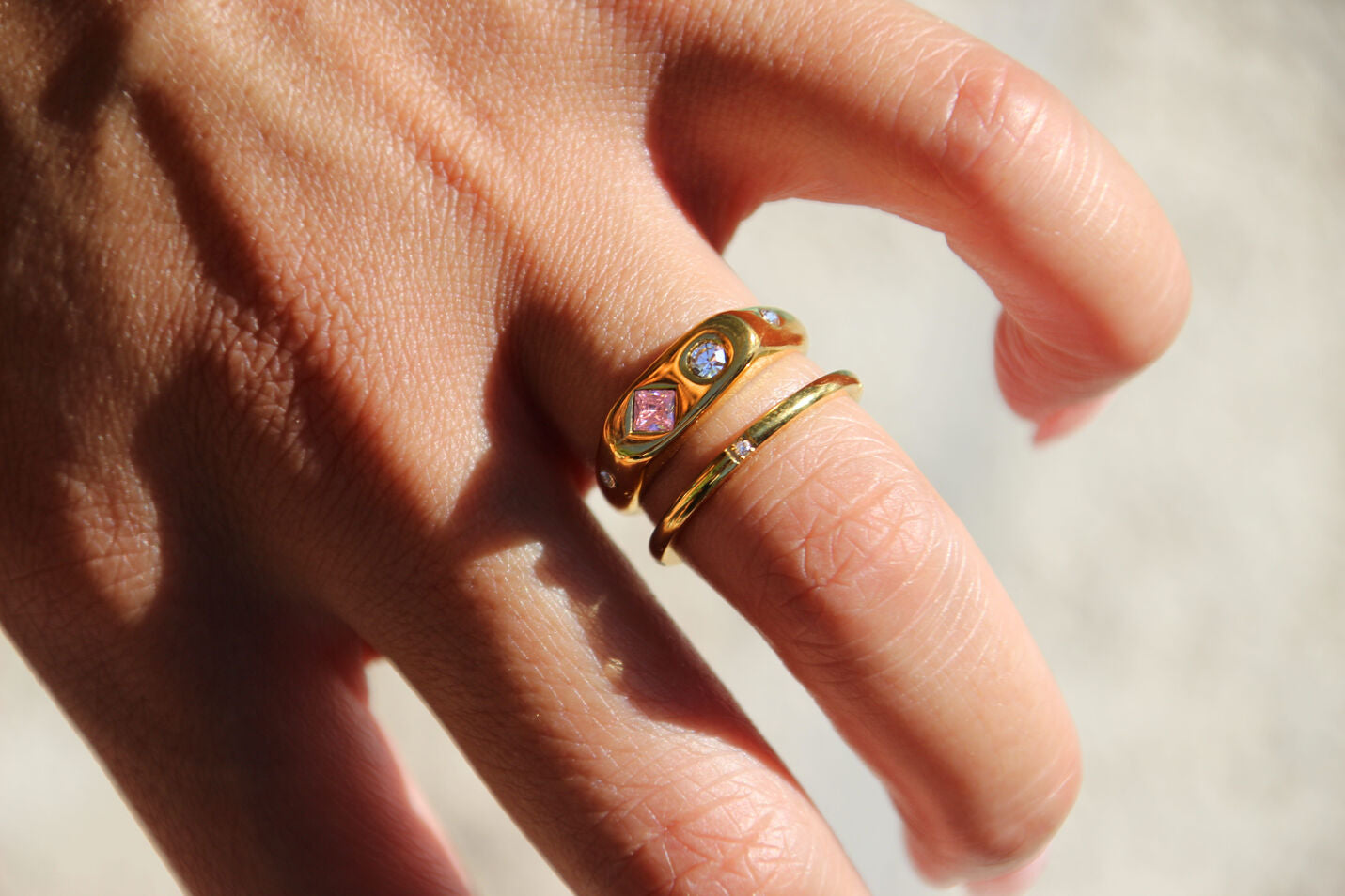 Gold ring with pink gem and clear stones, stainless steel, waterproof