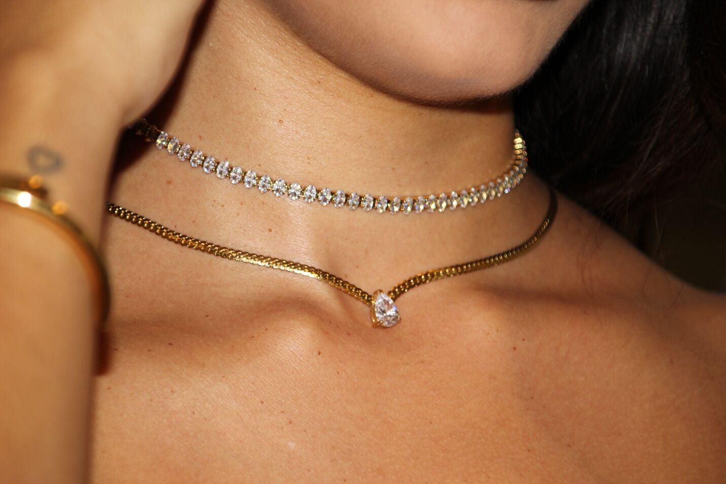 Gold necklace with teardrop-cut cubic zirconia pendant