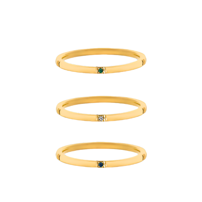 Trio of minimalist gold-plated stainless-steel rings with subtle color and sparkle, perfect for stacking or wearing solo.