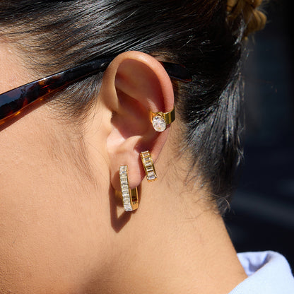 Detailed view of channel-set baguette crystals on Sofia Hoops gold-plated earring