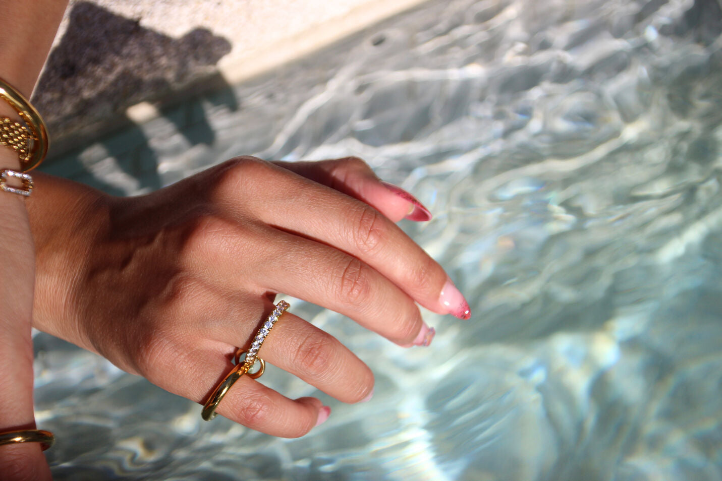 Gold-plated stainless steel statement ring with sparkling stones, waterproof and tarnish-resistant, perfect for bold and stylish looks.