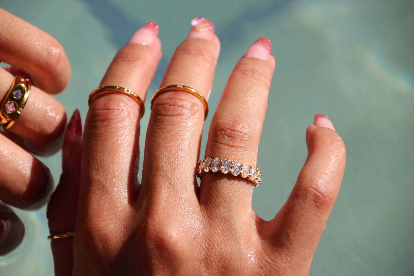 Gold-plated stainless steel eternity band with sparkling stones, waterproof and tarnish-resistant, perfect for everyday wear and special occasions